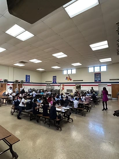 Dr. Rachel Edoho-Eket leading a JCTBF writers workshop with children in December 2025.
