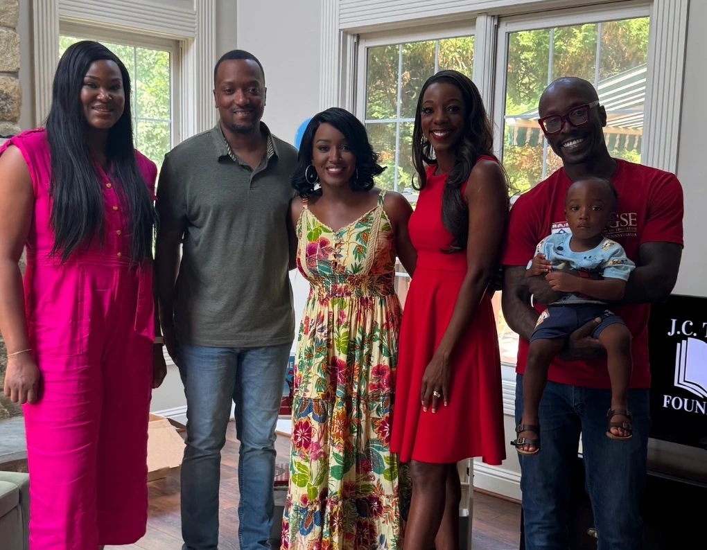 Dr. Rachel Edoho-Eket posing with parents at the inaugural Community Read Aloud Session.