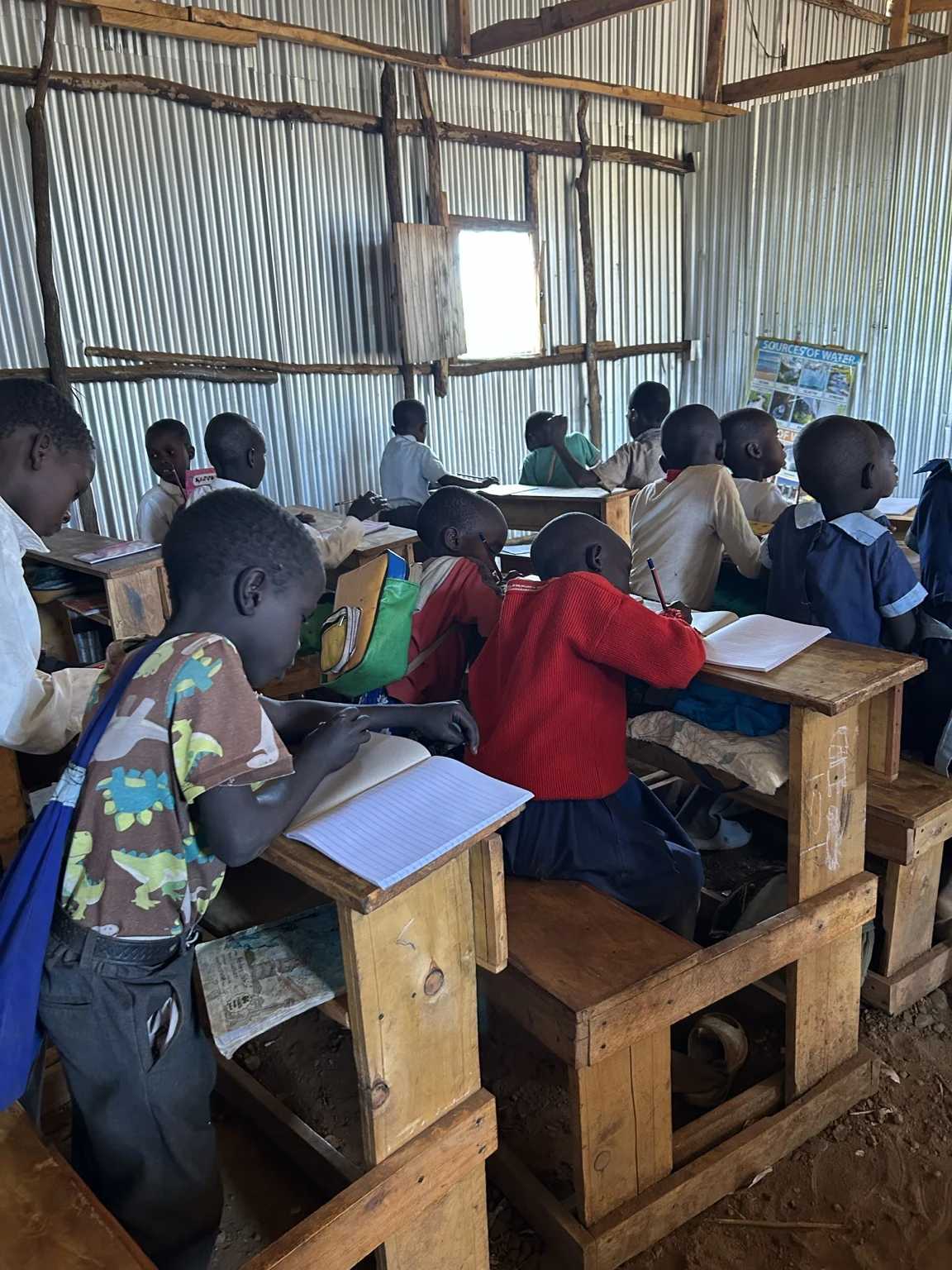 Students learning together in a classroom during the Foundation’s international literacy work