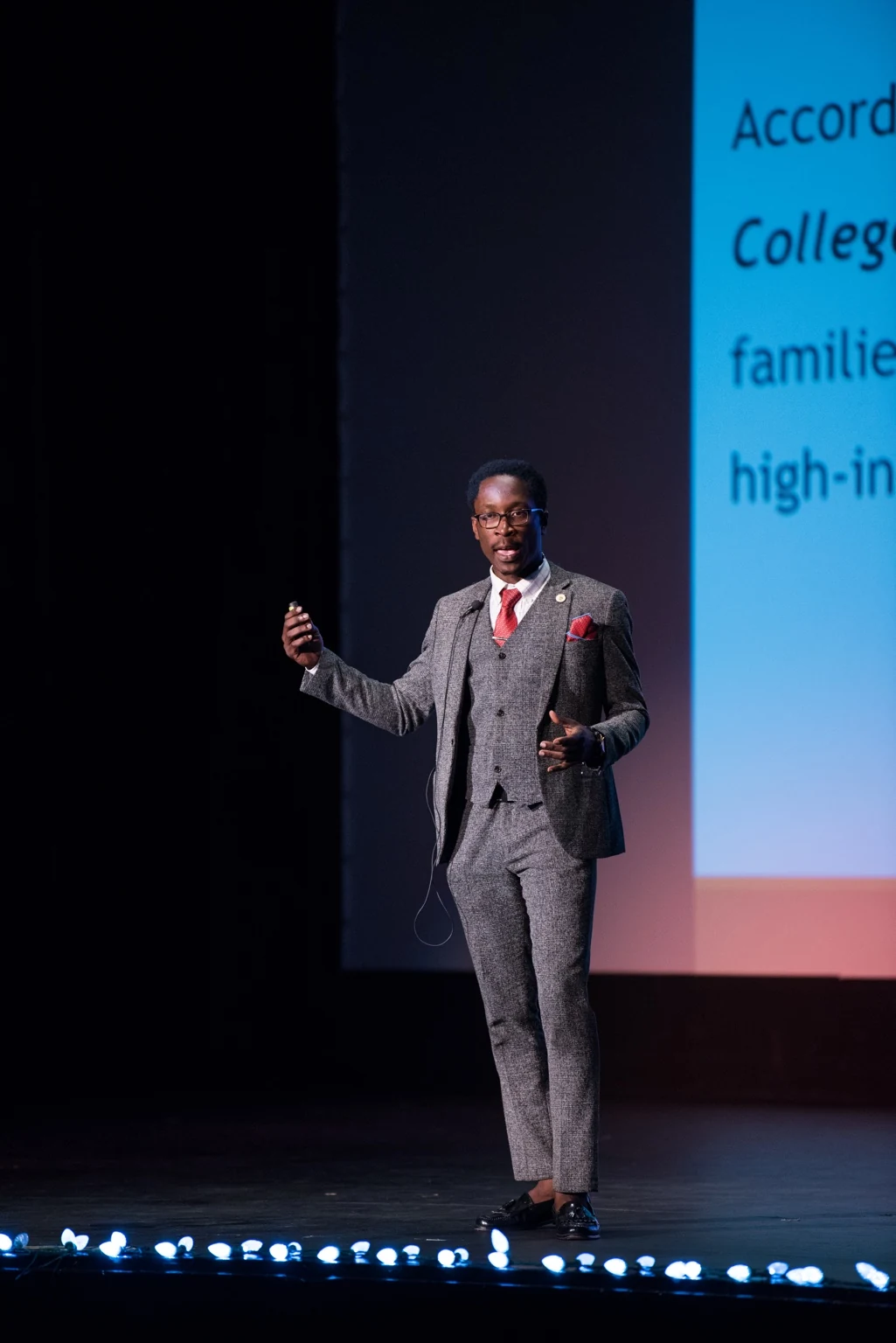 Rick Tamno speaking on stage during his TEDx presentation